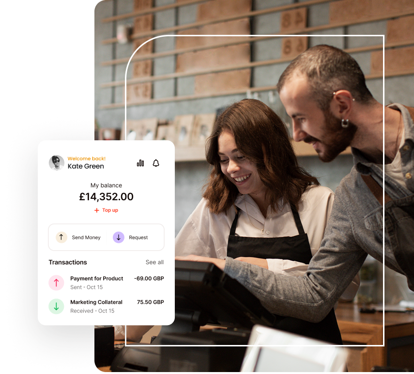 Two people taking payment in-store